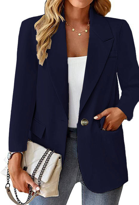 Ladies longline blazer in oversized style with a striking lapel, metal button, and patch pockets Mune Fashion