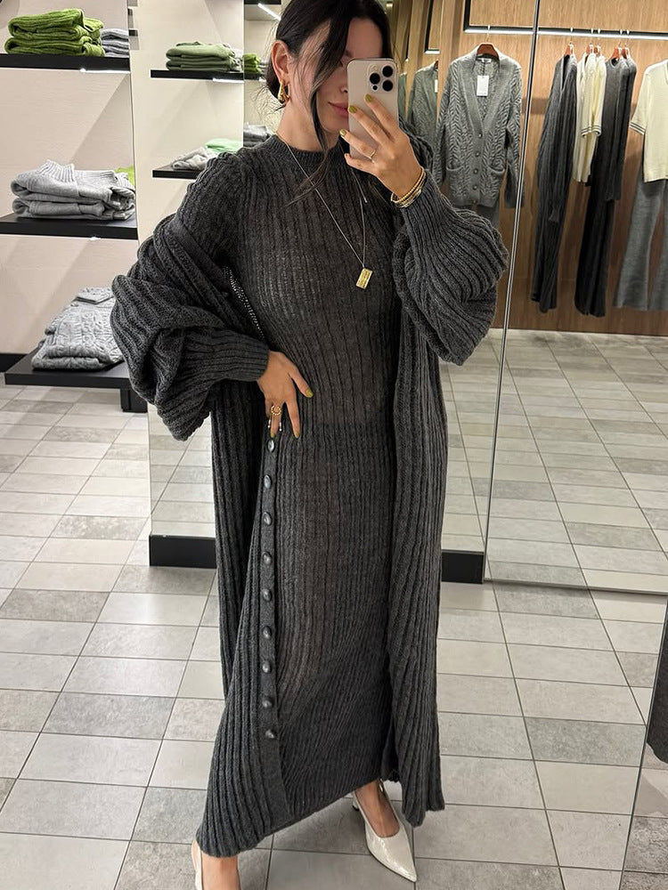 Women's long ribbed knitted dress with matching maxi cardigan, side buttons, and voluminous balloon sleeves