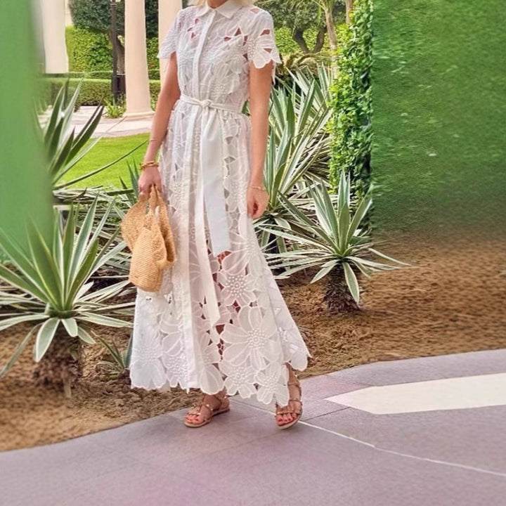 Women's flared maxi dress made of floral embroidery with a shirt collar, button placket, and tie belt Mune Fashion