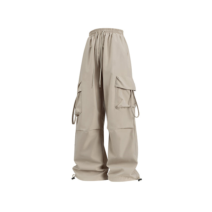 Unisex Wide Cargo Pants in Baggy Cut with Drawstring Waistband, Multiple Flaps, and Adjustable Leg Closures Drune