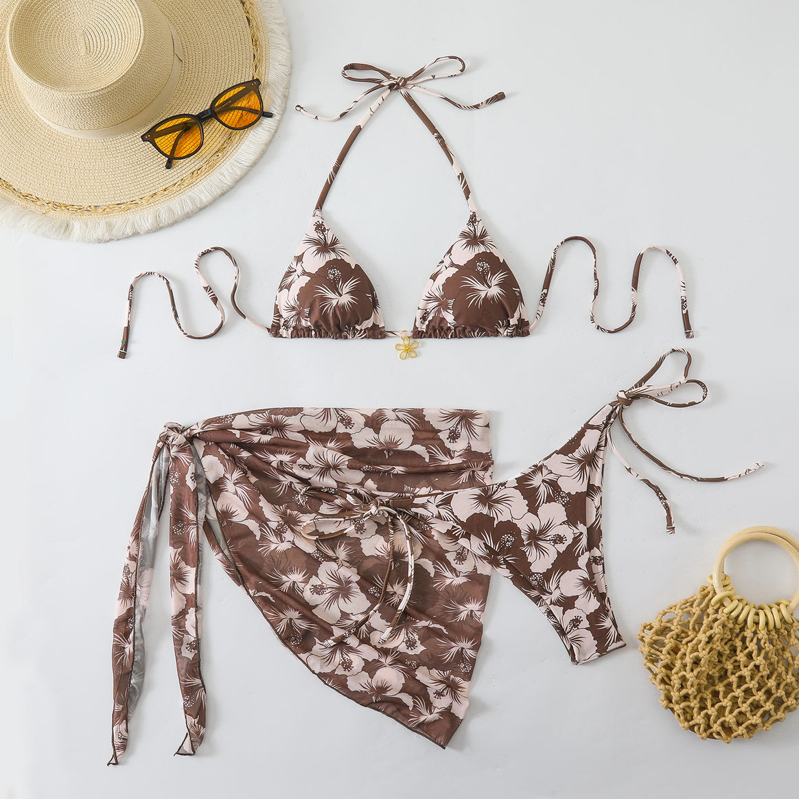 Women's bikini set with floral design and stylish wrap skirt Mune Fashion