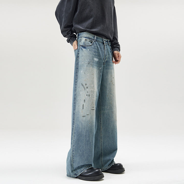Men's wide baggy jeans with paint splatter effect and vintage wash Mune Fashion