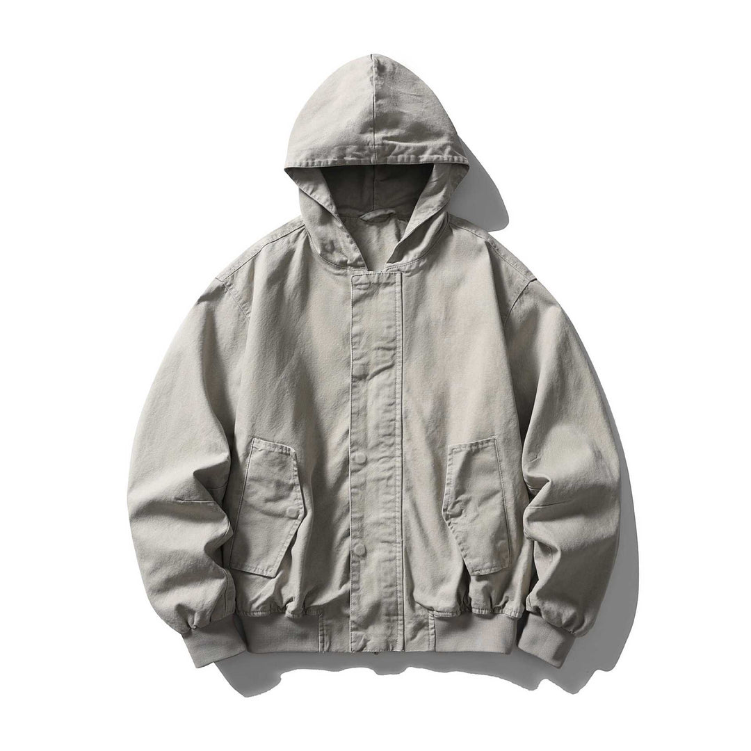 Unisex Boxy Utility Hooded Jacket made of sturdy canvas with ribbed cuffs and flap pockets Mune Fashion
