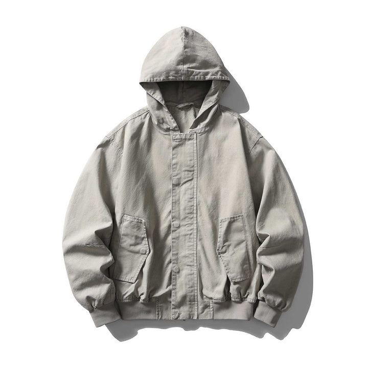 Unisex Boxy Utility Hooded Jacket made of sturdy canvas with ribbed cuffs and flap pockets Mune Fashion