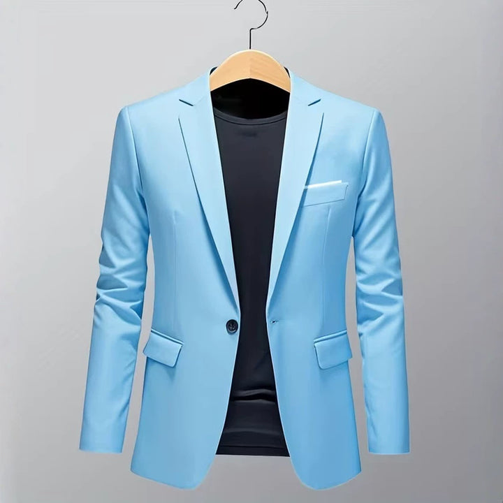 Men's slim-fit tuxedo jacket with prominent lapels, concealed breast piping, and light shoulder padding Mune Fashion