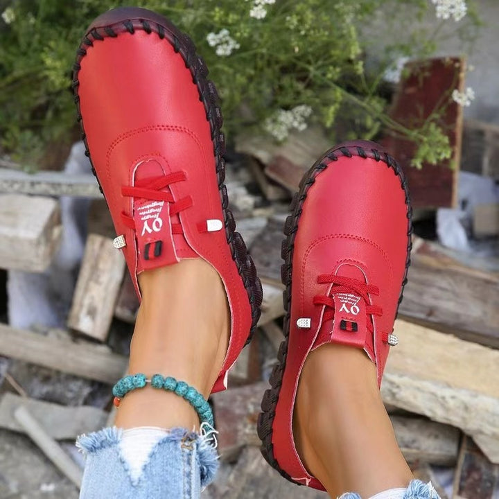 Women's hand-sewn moccasin loafers with elastic lacing, padded comfort insole, and patterned rubber sole Mune Fashion