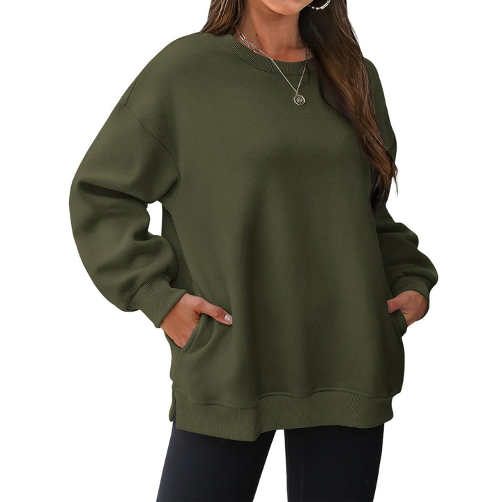 Women's extended oversized round neck sweater with side pockets, ribbed cuffs, and dropped shoulder Mune Fashion