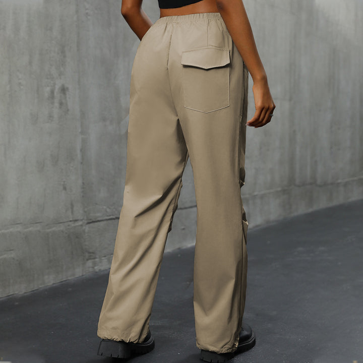 Women's loosely cut utility pants with high elastic waistband, drawstring hem & concealed button placket Mune Fashion