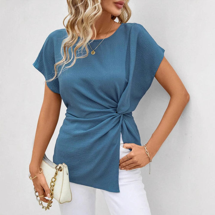 Women's fitted short sleeve draped shirt with side knot sling and textured crepe look Mune Fashion