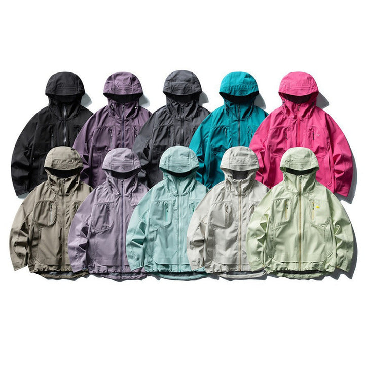 Unisex Technical Softshell Field Jacket with welded seams, four zippered pockets, and extended back part Mune Fashion