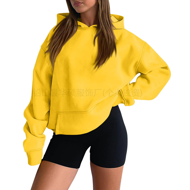 Women’s soft oversized hoodie with asymmetrical hem, kangaroo pocket, and dropped shoulder Mune Fashion