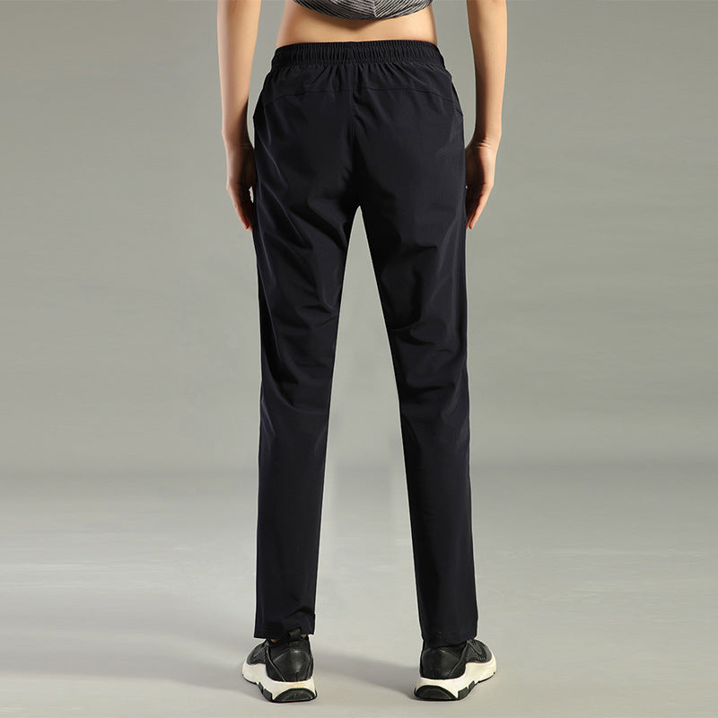 Men's Lightweight Sports Pants with Elastic Waistband and Practical Zip Pockets Mune Fashion
