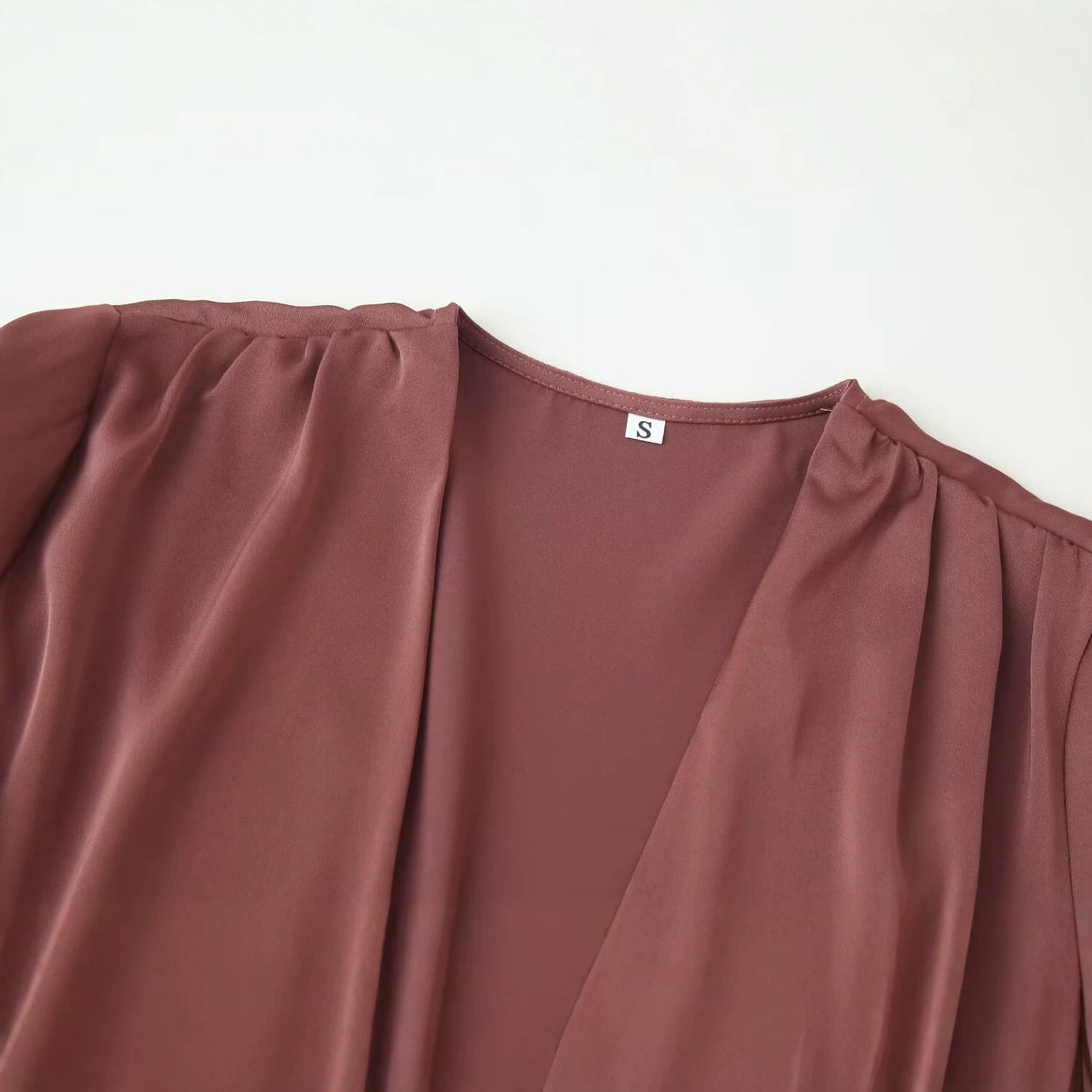 Women's elegant wrap blouse with waist belt and deep V-neck Mune Fashion