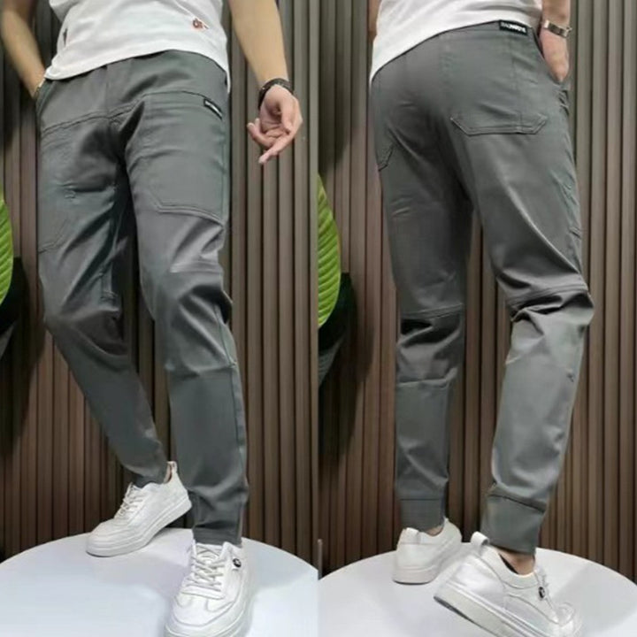 Men's sporty cargo jogger pants with elastic waistband, drawstring, and tapered leg hem Mune Fashion