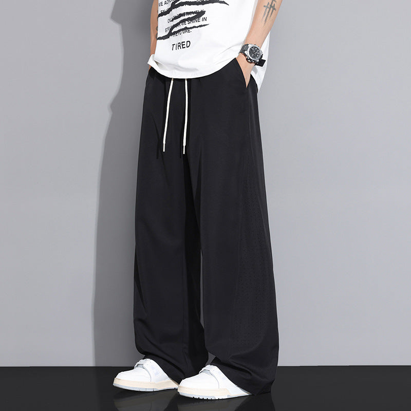 Men's Loose-Fitting Sports Pants with Breathable Mesh Inserts