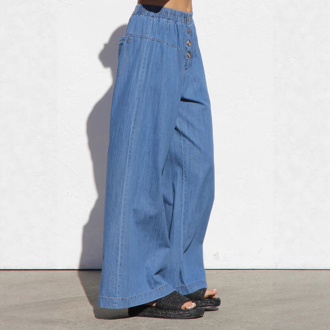 Women's wide high-waisted jeans with elastic waistband and decorative button placket Mune Fashion