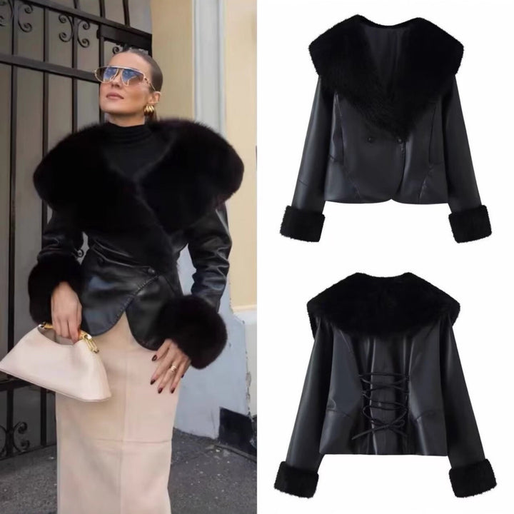 Women's short jacket made of synthetic leather with voluminous faux fur collar and fur cuffs Mune Fashion