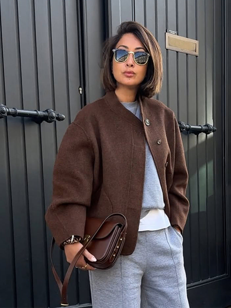 Women's short jacket made of wool blend in boxy cut with minimalist round neckline Mune Fashion