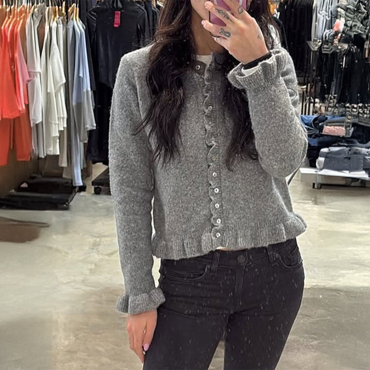 Women’s short cut knit cardigan with ruffled button placket and gathered cuffs Mune Fashion