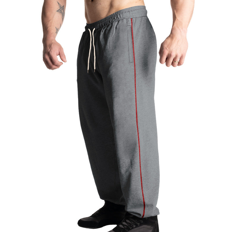 Men's casual jogging pants with elastic drawstring waistband, subtle side stripe, and deep side pockets Mune Fashion