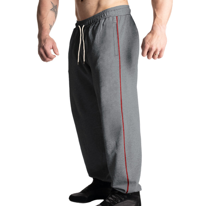 Men's casual jogging pants with elastic drawstring waistband, subtle side stripe, and deep side pockets Mune Fashion