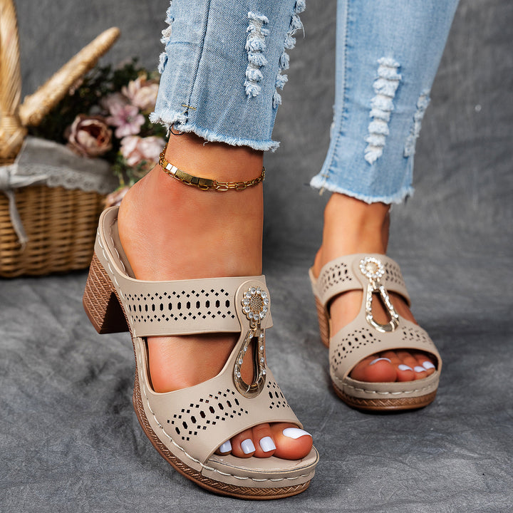 Ladies sandals with block heel, perforated upper material and decorative application Mune Fashion