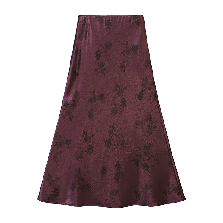 Women's high-waisted A-line midi skirt in jacquard-like satin with floral relief print.