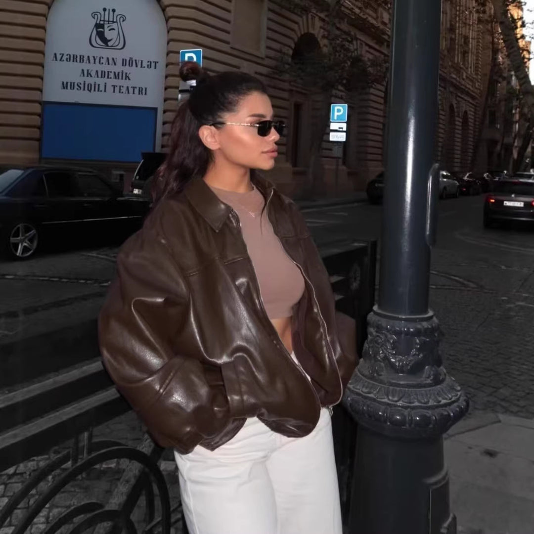Women's oversized leather jacket in bomber style with shirt collar, continuous zipper and casual silhouette Mune Fashion
