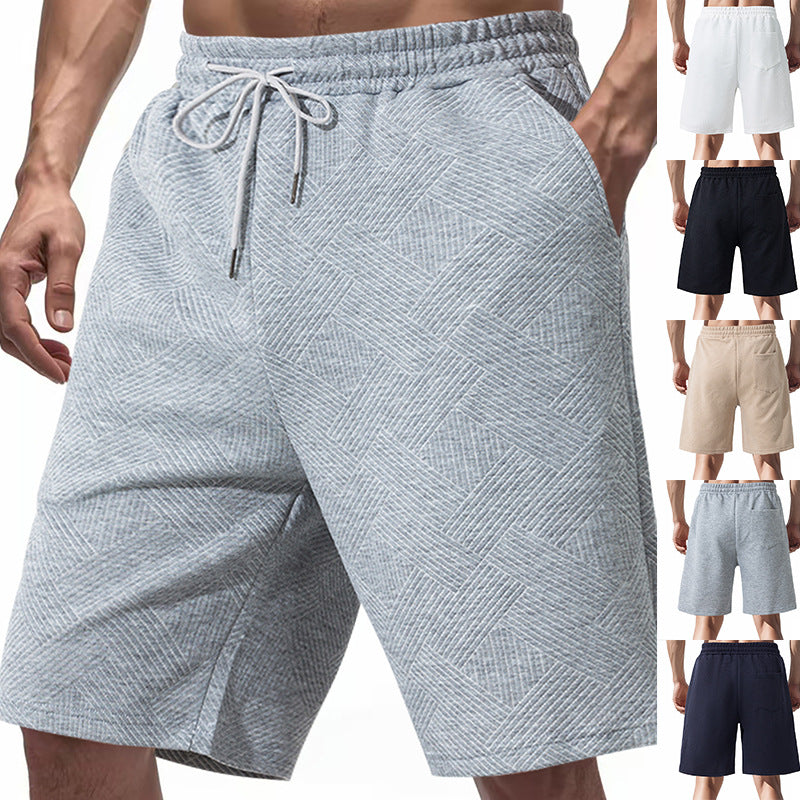 Men's knee-length textured swim shorts with elastic drawstring waistband and side pockets Mune Fashion