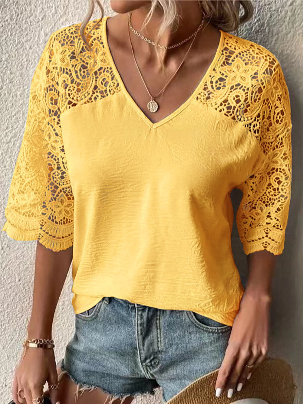 Women's V-neck lace blouse with elbow-length crochet sleeves and lightweight crepe fabric Mune Fashion