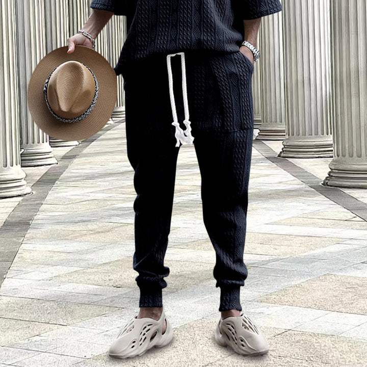 Men's cable-knit joggers with drawstring, patch pockets, and ribbed cuffs Mune Fashion