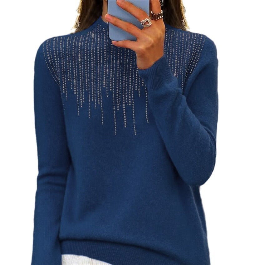 Women's cozy fine knit sweater with subtle rhinestone embellishment at the round neckline and ribbed hem Mune Fashion