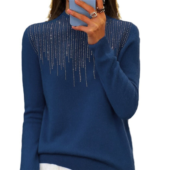 Women's cozy fine knit sweater with subtle rhinestone embellishment at the round neckline and ribbed hem Mune Fashion