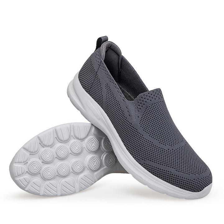 Women's slip-on knit trainer with sock-like shaft, pull tab, and responsive cushioning Mune Fashion