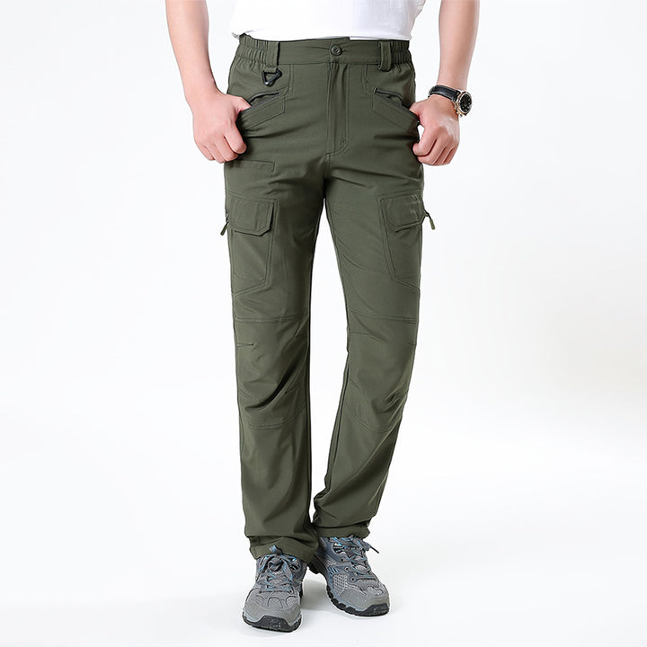 Men's nano technical trekking pants with elastic waistband, pre-shaped knees, and multiple cargo and zip pockets.