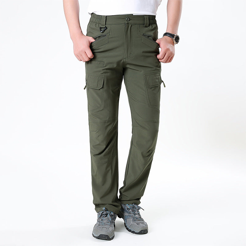 Men's nano technical trekking pants with elastic waistband, pre-shaped knees, and multiple cargo and zip pockets.