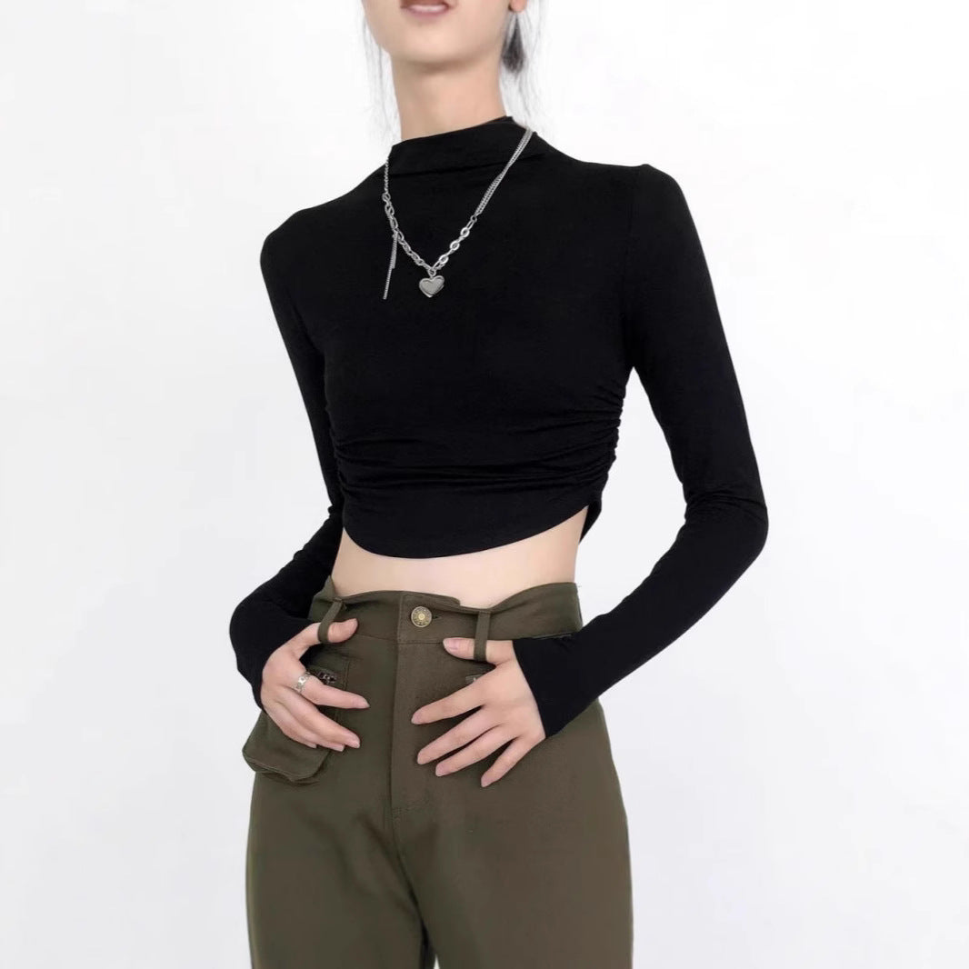 Ladies form-fitting long sleeve cropped top with stand-up collar, side gathering and extended sleeves Mune Fashion