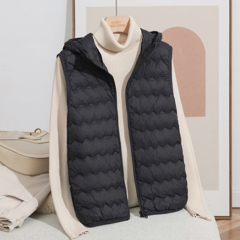 Women Ultra-light Hooded Quilted Vest with Ergonomic Wave Quilting and Compact Packing Format Mune Fashion