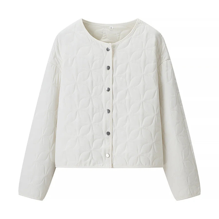 Women's quilted boxy transitional jacket with floral quilted texture, lightly padded inner lining and press stud placket Mune Fashion