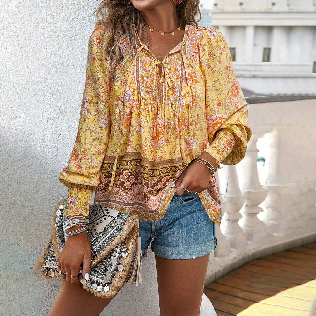 Women's loose Boho tunic with V-neck, tie belt, gathered sleeves, and floral pattern Mune Fashion