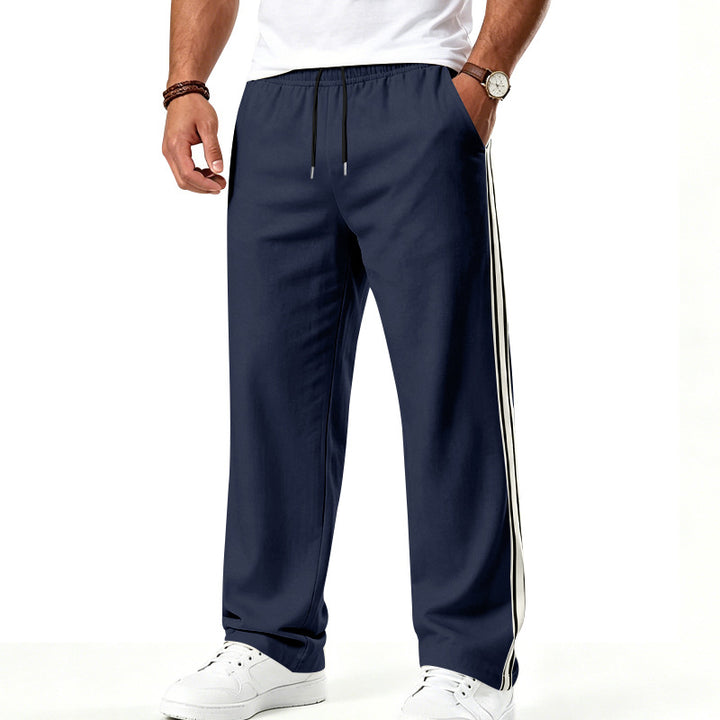 Men's loose-fitting training pants with double side stripes and elastic waistband Mune Fashion