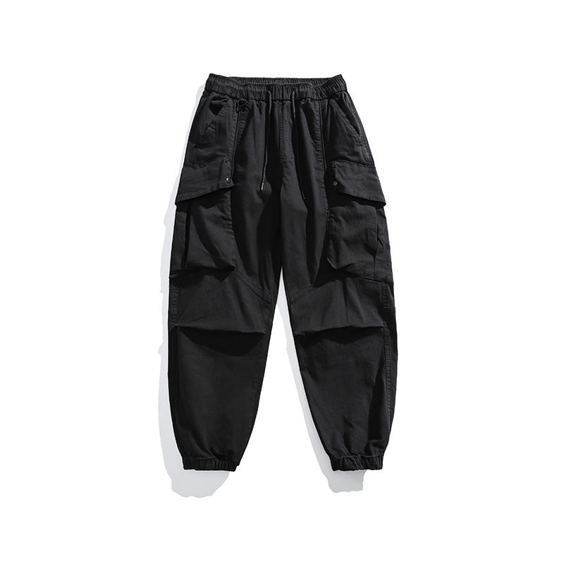 Men's utility cargo pants with elastic waistband, multiple pockets, and elastic cuffs.