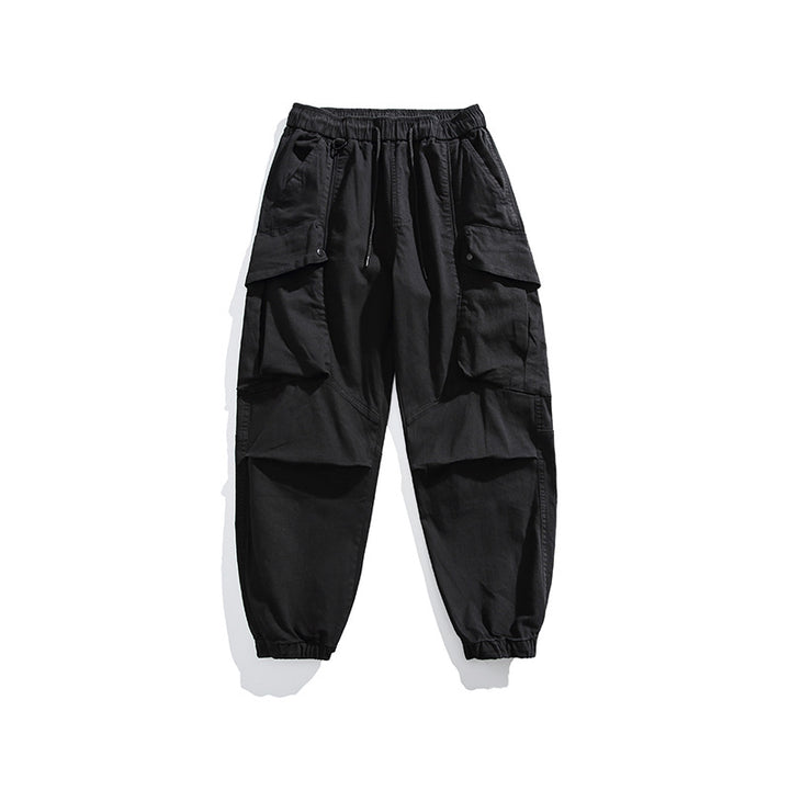Men's utility cargo pants with elastic waistband, multiple pockets, and elastic cuffs.