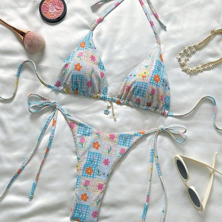 Ladies triangle bikini with playful flower details Mune Fashion