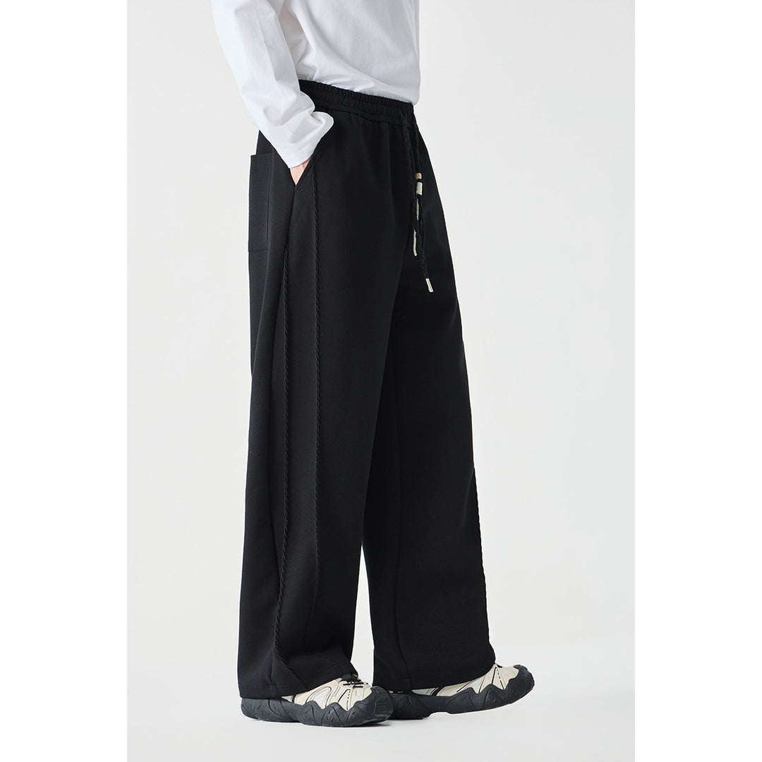 Women's Wide High-Waist Jogging Pants with Decorative Seams and Drawstring Mune Fashion