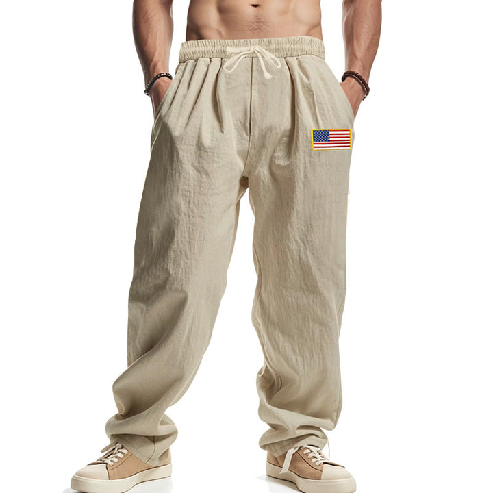 Men's loose-fitting leisure pants in linen look with elastic waist, drawstring & flag patch Mune Fashion