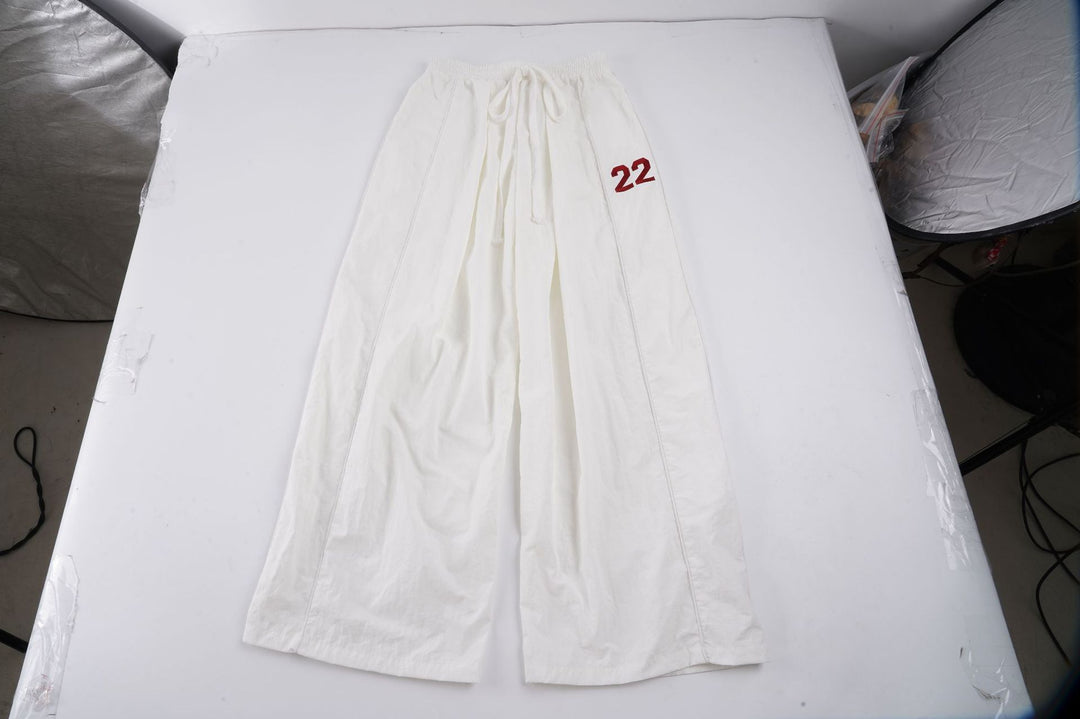 Ladies wide linen trousers with high elastic waistband, drawstring and casual palazzo cut Mune Fashion