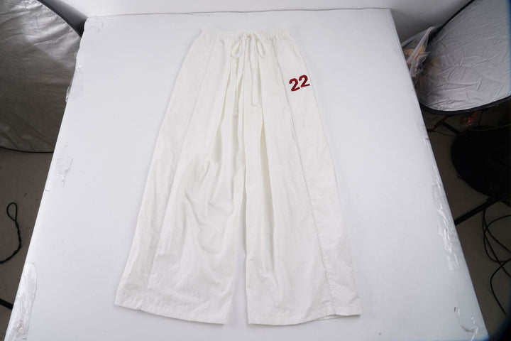 Ladies wide linen trousers with high elastic waistband, drawstring and casual palazzo cut Mune Fashion