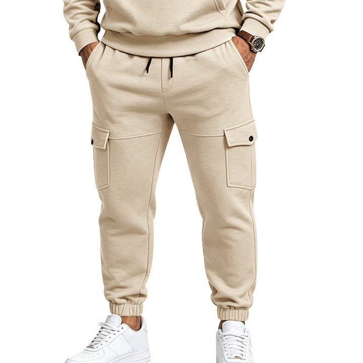 Men's cargo jogging pants with side flap pockets, drawstring and elastic cuffs Mune Fashion