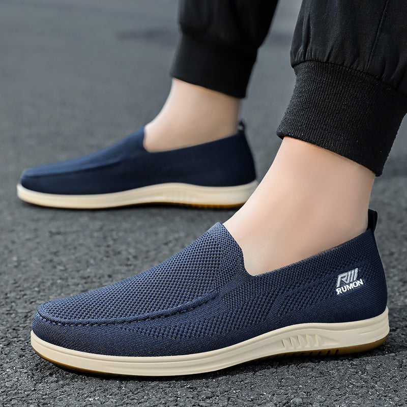 Men's lightweight mesh moccasin slipper with seamless knit upper, memory comfort insole, and slip-resistant flex sole Mune Fashion